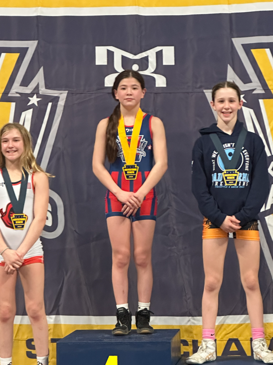 Abby Guzzo at the top of the podium