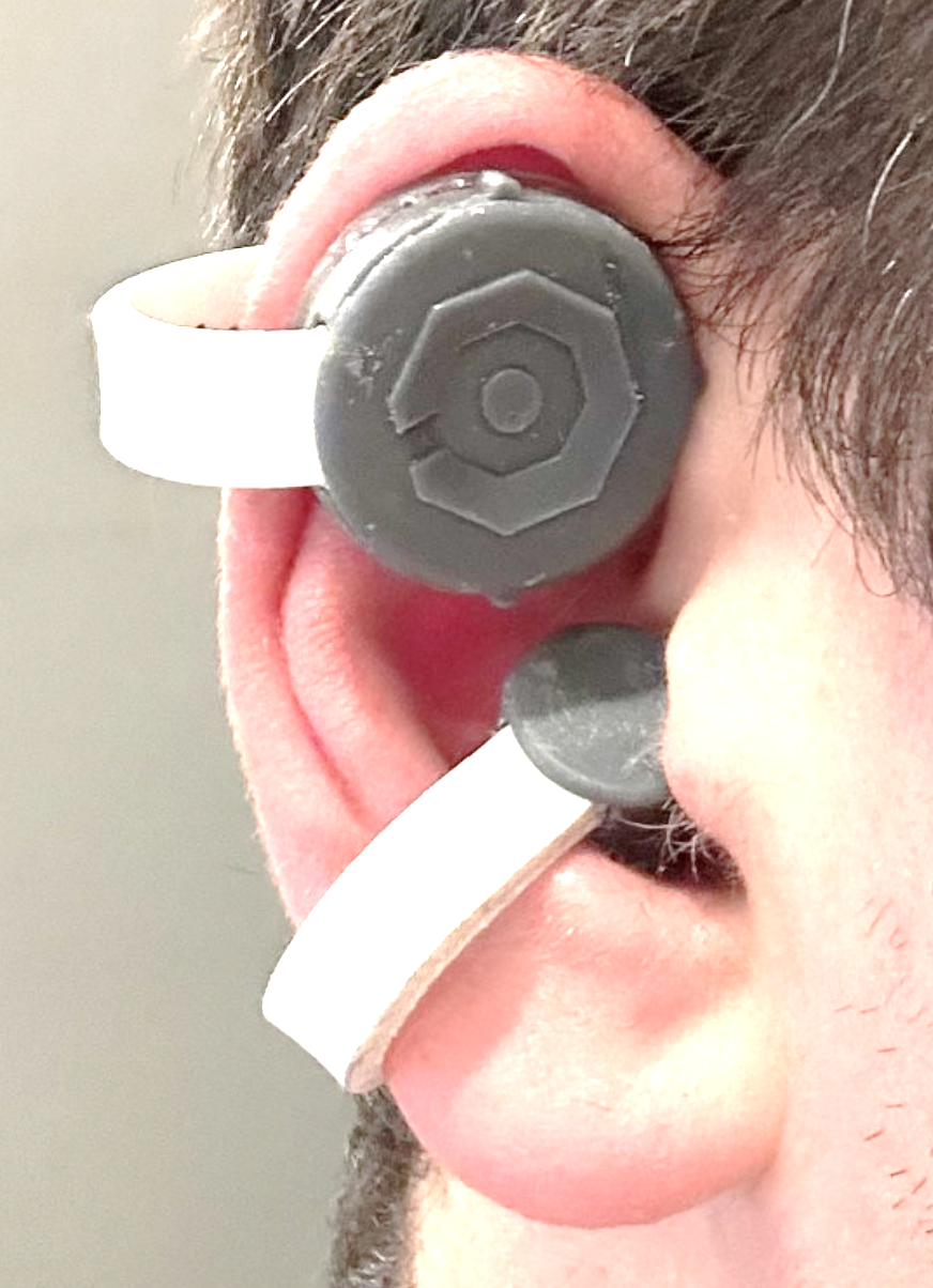 EarArmor moldable magnet compression device worn on the ear