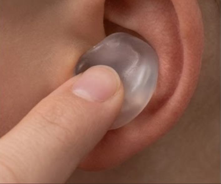 Pressing the softened plug to mold it